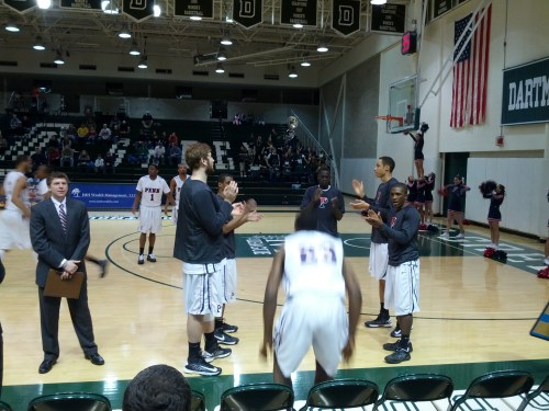 The Penn Men’s Basketball team during pre-game warm-up. Note the largest Ivy League banner we have ever seen.