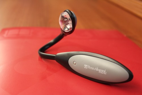Silver level travel reading light. We love how compact and flexible it is.
