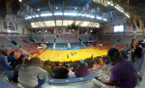 Caption: 76ers fans gathered to watch the team practice