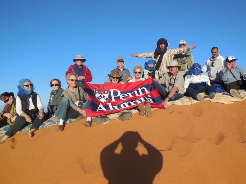 Penn alumni and friends at the top of the dune.