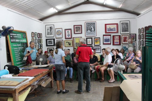 Conversations in a graphic art studio in Cienfuegos, Cuba.