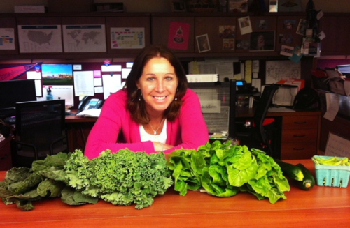 Elise Betz poses in front of the partial share that we are splitting this season