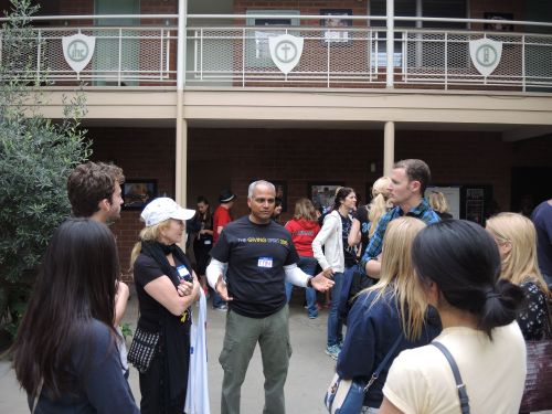 Tom talks to the group about the founding of The Giving Spirit and the work that they do to help the homeless in Los Angeles.