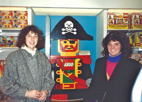 Lisa Bardfeld Shapiro, C'93, and Regan Allan, C'93, at the Lego display in FAO Schwartz.
